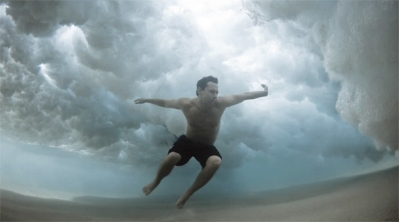 swimmer under wave