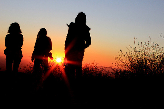 photographers at sunset