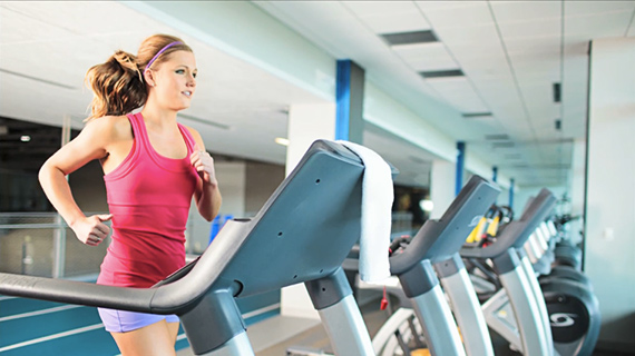 girl running on treadmill