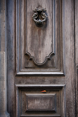 "Old Door and Pizza Menu, Florence" captured by James Maher.