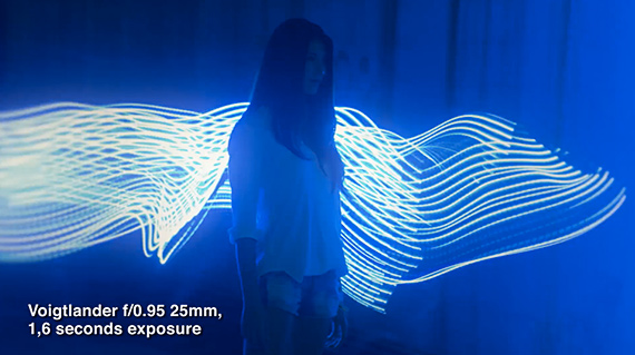 woman surrounded by light trails