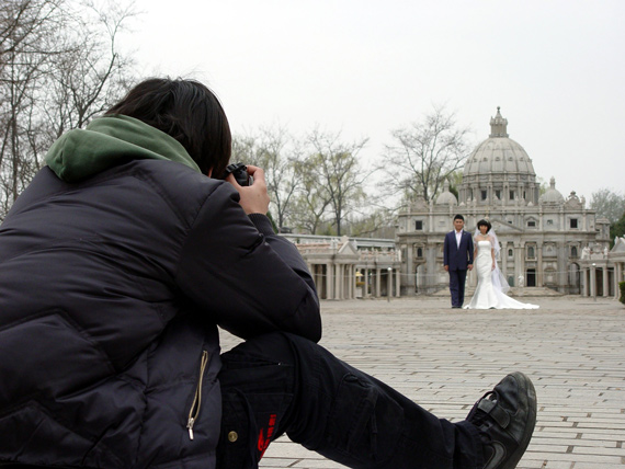 Don't dress in street wear like this photographer. — "Wedding Photographer" captured by "omefrans" (flickr account name). Click image to see more from omefrans.