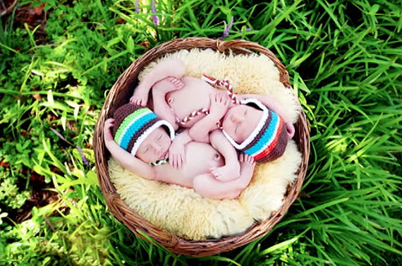 fetal position twins sisters brothers basket grass outside