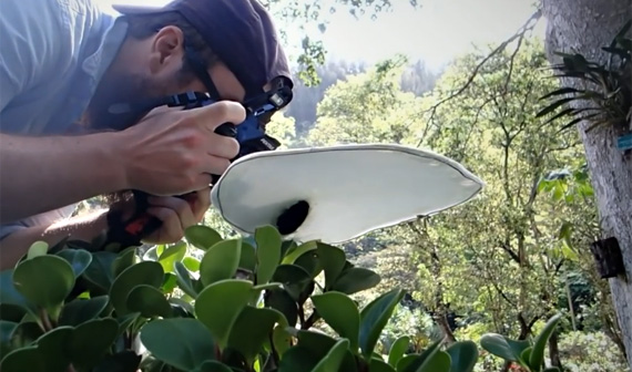 Photographer Thomas Shahan with his homemade diffuser. Image by Kathleen Neeley.