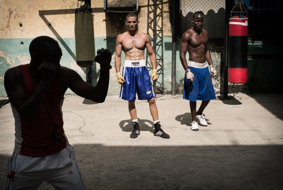 men boxing in street