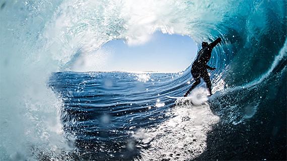 surfer riding wave photo