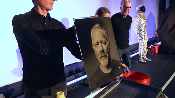 'The camera adds a good twenty years' sends the audience into fits of laughter as the wet plate magically transforms into a portrait of Adam Savage