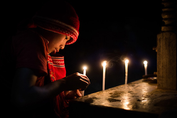  Burmese novice lighting candles