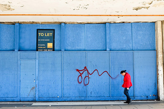 red coat street photography