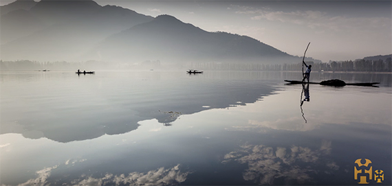 lake ocean water reflection mountains boat fishermen fisherman net