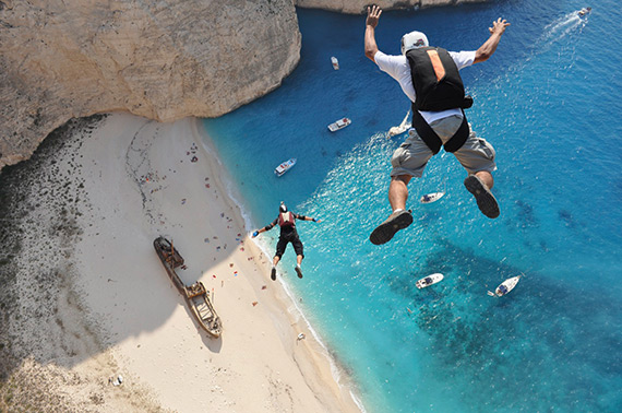 skydiving over beach photo