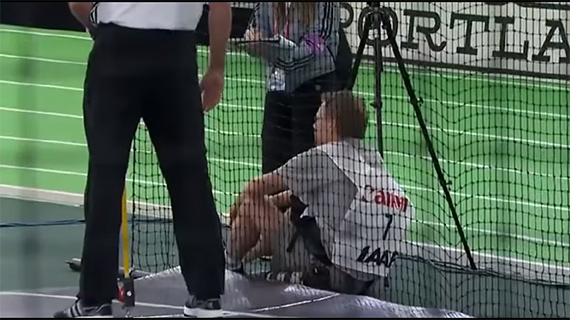 sports photographer gets hit by short put