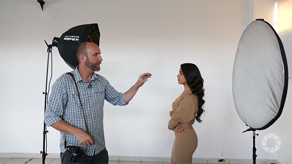 Using a silver reflector for studio portrait session