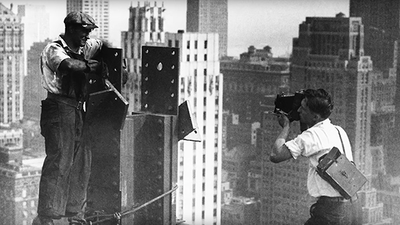 photographer framing worker