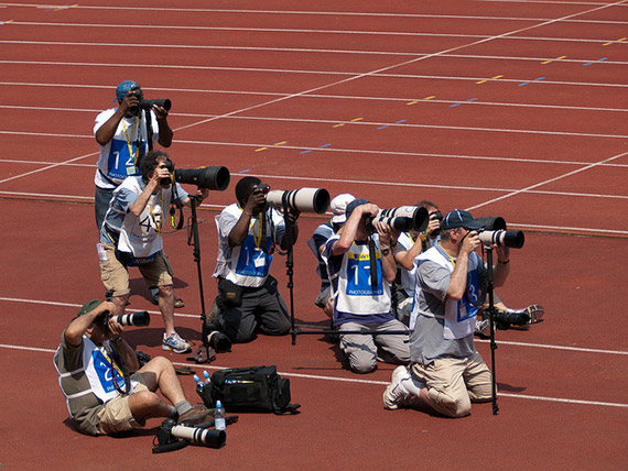 sports photographer in a group