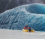 Interesting Photo of the Day: Massive Iceberg Rolls Over Exposing Dark Blue Underbelly