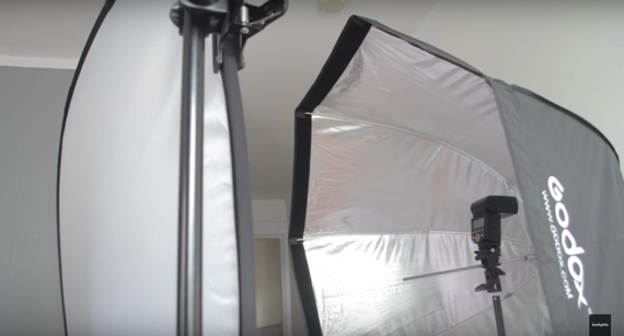 The backlight is a speedlight shooting into an umbrella 