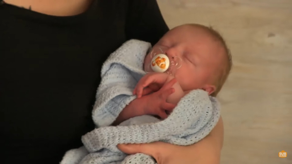 newborn with pacifier