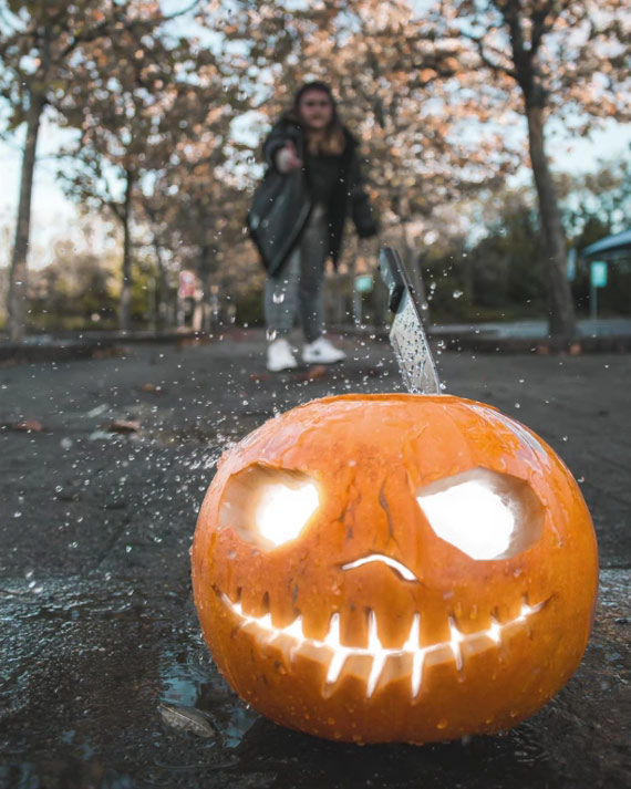 mid-action portrait shot with pumpkin