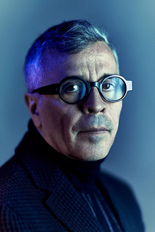 portrait of a serious man in glasses