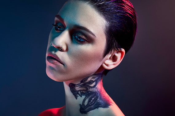 portrait of model with wolf tattoo