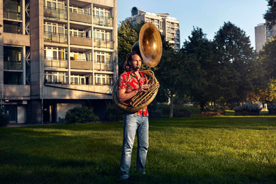 portrait of man playing tuba