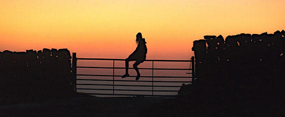 silhouette in front of sunset