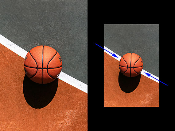 lines lead the viewer's eyes toward the basketball