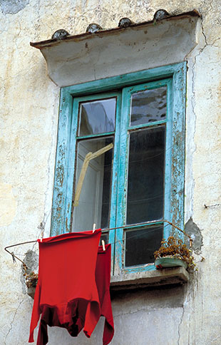 ambivalent photo of window and red shirts